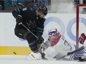 Canadiens goaltender Jake Allen stymies Sharks centre Andrew Cogliano during the second period Thursday night in San Jose.