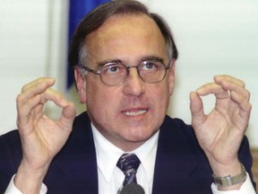 Jean Rochon, then health minister, makes an announcement in November 1995. Rochon has died at age 83.