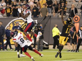 Montreal Alouettes wide-receiver Eugene Lewis makes a touchdown catch to give his team the lead late in the second half against the Hamilton Tiger-Cats in Hamilton, Ont., on Oct. 2, 2021.