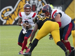 Montreal Alouettes quarterback Vernon Adams Jr. gets set to throw during first half against the Hamilton Tiger-Cats in Hamilton on Oct. 2, 2021.