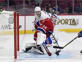 Canadiens' Jake Allen makes a save against Toronto Maple Leafs forward Ilya Mikheyev during first period at the Bell Centre on Sept. 27, 2021.