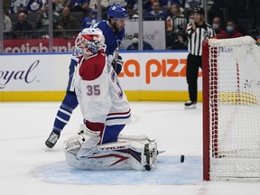 A shot by Maple Leafs forward Nick Ritchie eludes Canadiens goaltender Samuel Montembeault during the first period Tuesday night at Scotiabank Arena in Toronto.