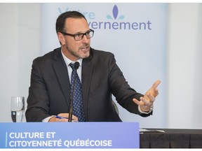 Quebec Education Minister Jean-François Roberge speaks during a news conference in Montreal, Sunday, October 24, 2021, where he outlined plans to replace a class on religious culture and ethics.