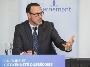 "We want to fight against sexism; we want to fight against racism; we want to fight against homophobia," says Quebec Education Minister Jean-François Roberge, seen at a news conference in Montreal on Sunday, Oct. 24, 2021. "We want to introduce Quebecers to Quebec institutions. I don’t think any reasonable Quebecers could say that they have a problem with that."