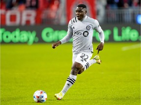 CF Montréal forward Sunusi Ibrahim moves the ball against Toronto FC at BMO Field in Toronto on Oct. 23, 2021.