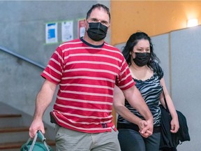 Guy Dion and Marie-Josée Viau were charged with the 2016 murders of brothers Vincenzo and Giuseppe Falduto. The couple entered the Gouin Courthouse in Montreal on Thursday May 27, 2021.