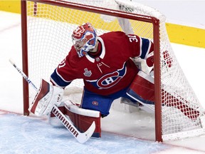 Montreal Canadiens goaltender Carey Price (31) retreats deep in to his net after stopping a shot by the Tampa Bay Lightning during the Stanley Cup finals, game 4, in Montreal on Monday, July 5, 2021. On Nov. 9, he announced that he had been treated for substance abuse, and that he was taking a break to tend to his mental health.