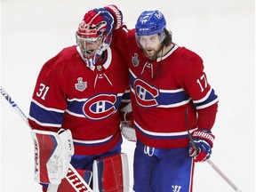 Montreal Canadiens' Josh Anderson celebrates his overtime goal with goalie Carey Price during Stanley Cup final against the Tampa Bay Lightning in Montreal on July 5, 2021.