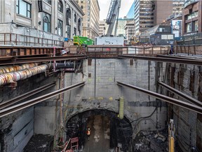 Construction of the 
future REM site under McGill College Ave. continues in Montreal on Nov. 1, 2021.