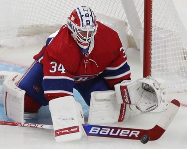 Montreal Canadiens goaltender Jake Allen stops shot during third-period action in Montreal on Tuesday, Nov. 2, 2021.