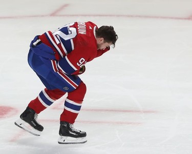 Montreal Canadiens' Jonathan Drouin skates away to the bench after being hit in the face by puck during first-period action in Montreal on Tuesday, Nov. 2, 2021.