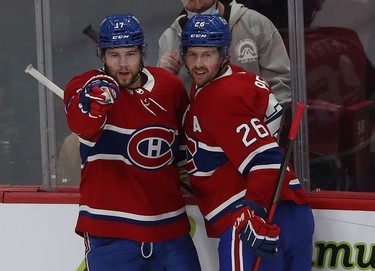 Montreal Canadiens' Josh Anderson (17) celebrates his goal with teammate Jeff Petry (26) during first-period action in Montreal on Tuesday, Nov. 2, 2021.