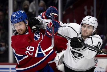 Los Angeles Kings right wing Adrian Kempe (9) gives Montreal Canadiens defenseman Jeff Petry (26) a shot to the head at the Bell Centre on Tuesday, Nov. 9, 2021.