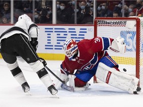 Kings' Adrian Kempe beats Canadiens goalie Jake Allen for the winning goal in overtime Tuesday night at the Bell Centre.