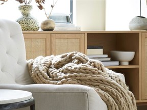 A cosy throw in a neutral colour makes the perfect home-related gift to give. Nude Chunky Knit Throw, $40, HomeSense.ca