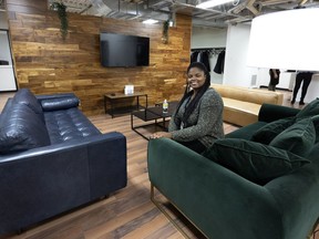 Nancy Morisseau of the Welcome Hall Mission shows the media the lounge area at a new community centre located above the mission's Montreal North food bank, on Nov. 15, 2021.