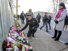 Montreal Mayor Valérie Plante and police chief Sylvain Caron brought flowers to a memorial at the site of the shooting death of 16-year-old Thomas Trudel in St-Michel on Nov. 16, 2021.