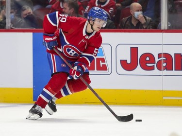 Montreal Canadiens' Mattias Norlindder handles the puck during first period in Montreal Thursday, Nov. 18, 2021.
