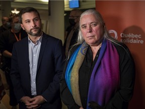 Québec solidaire co-spokespersons Gabriel Nadeau-Dubois and Manon Massé are seen in press scrum at the Gesù theatre in Montreal on Saturday, Nov. 20, 2021.