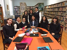 Sacred Heart School of Montreal teacher Erika Rath with her students.