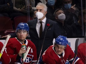 Montreal Canadiens head coach Dominique Ducharme behind the bench during a game against the Calgary Flames in Montreal on Nov. 11, 2021.