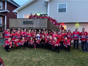 Family members and friends of Edward (Gig) Bambrick wear Canadiens sweaters at a reception following his funeral in St. John's. Bambrick was a huge Canadiens fan.