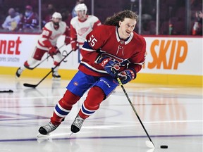 Canadiens' Michael Pezzetta leads the team out for warmups prior to his first career NHL game, against the Detroit Red Wings at the Bell Centre in Montreal on Nov. 2, 2021.