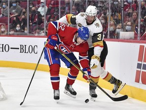 Canadiens' Artturi Lehkonen battles for the puck with Brayden McNabb (3) of the Vegas Golden Knights during the second period at the Bell Centre on Saturday, Nov. 6, 2021, in Montreal.