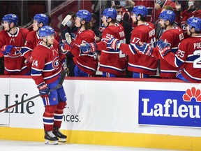 Nick Suzuki of the Montreal Canadiens celebrates his goal during the third period against the Calgary Flames at the Centre Bell on Nov. 11, 2021