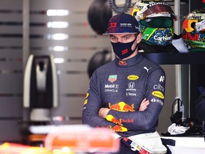 Max Verstappen of Netherlands and Red Bull Racing looks on in the garage during practice ahead of the F1 Grand Prix of Brazil at Autodromo Jose Carlos Pace on November 13, 2021 in Sao Paulo, Brazil.