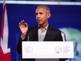 Former U.S. president Barack Obama delivers a speech while attending COP26 at SECC in Glasgow, Scotland, Monday, Nov. 8, 2021.