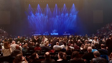 Fans get settled in before the start of the Genisis concert at the Bell Centre in Montreal on Monday, Nov. 22, 2021.