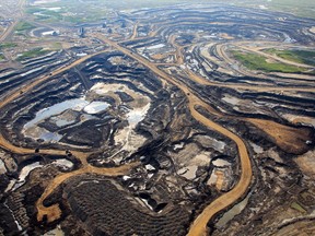 An aerial view of Canadian Natural Resources Limited (CNRL) oilsands mining operation near Fort McKay, Alta. in 2013.