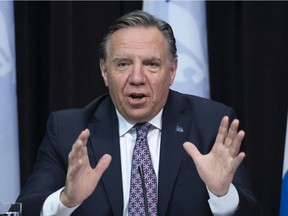 Quebec Premier François Legault announces the vaccination for kids between five and 11 years old, during a news conference on the COVID-19 pandemic, Tuesday, Nov. 23, 2021 at the legislature in Quebec City.