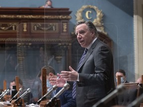 Premier François Legault responds to an Opposition question on the report of Ombudsperson Marie Rinfret and the management of the first wave of the COVID-19 pandemic in seniors homes, during question period at the Legislature in Quebec City, Wednesday, Nov. 24, 2021.