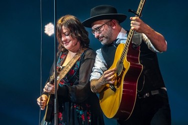 Marie-Annick Lépine and Jean-François Pauzé, left to right, of the Quebec band Les Cowboys Fringants at the Bell Centre in Montreal on Thursday, Nov. 25, 2021.