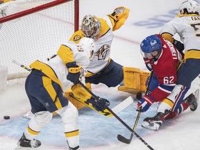 Canadiens' Artturi Lehkonen (62) scores against Nashville Predators goaltender Juuse Saros during first period NHL hockey action in Montreal on Saturday, Nov. 20, 2021.