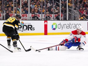 Canadiens' Jeff Petry  defends Bruins' David Pastrnak in November 2021.