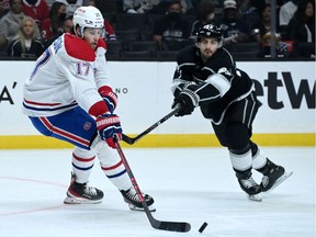 Los Angeles Kings left wing Phillip Danault (24) defends Montreal Canadiens right wing Brendan Gallagher (11) as he passes the puck in the first period of the game at Staples Center on Oct. 30.