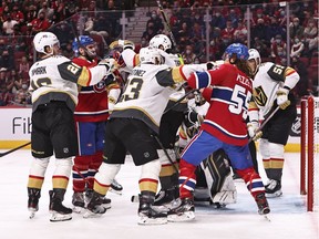Vegas Golden Knights and Montreal Canadiens players exchange blows during the first period at Bell Centre.