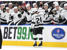 Phillip Danault is congratulated by his Los Angeles Kings teammates after scoring one of his two goals in 5-1 win over the Maple Leafs Monday night in Toronto.