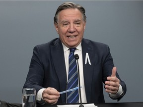 Opposition leaders accused Premier François Legault of putting politics before science in his remarks about Christmas gatherings on Monday.