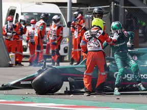 Aston Martin's Lance Stroll after crashing out during qualifying at the Mexico Grand Prix at Autodromo Hermanos in Rodriguez, Mexico City, on Saturday, Nov. 6, 2021.