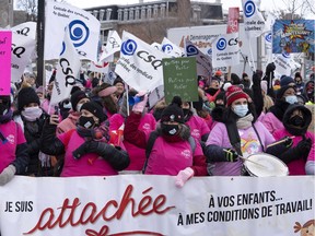 Daycare workers demonstrate to push lagging contract talks Tuesday, November 23, 2021 in Montreal.