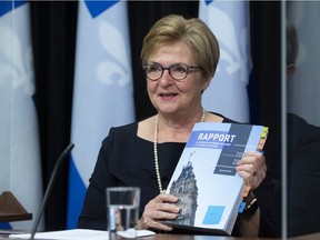 Quebec's Auditor General Guylaine Leclerc unveils a report, at the Legislature in Quebec City, Wednesday, Nov. 24, 2021.