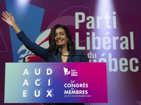Quebec Liberal Leader Dominique Anglade waves to delegates before her opening speech, at the Quebec Liberal members convention, Friday, November 26, 2021 in Quebec City.