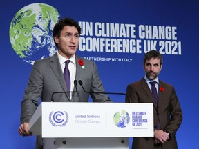 Prime Minister Justin Trudeau and Minister of Environment and Climate Change Steven Guilbeault hold a press conference at COP26 in Glasgow, Scotland on Tuesday, Nov. 2, 2021.