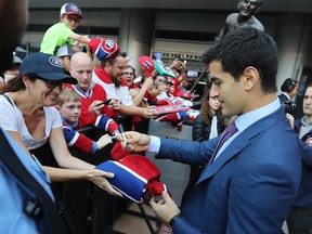Former Canadiens captain Max Pacioretty signs autographs outside the Bell Centre before a game against the Chicago Blackhawks on Oct. 10, 2017.