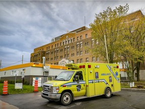 An ambulance parked outside the emergency department at the Lachine Hospital in Montreal on Oct. 26, 2021. The hospital's ER has been closed overnight since Nov. 7.