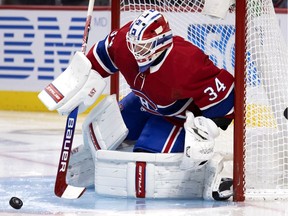 Montreal Canadiens goaltender Jake Allen gets ready to make a save against the Los Angeles Kings in Montreal on Nov. 9, 2021.